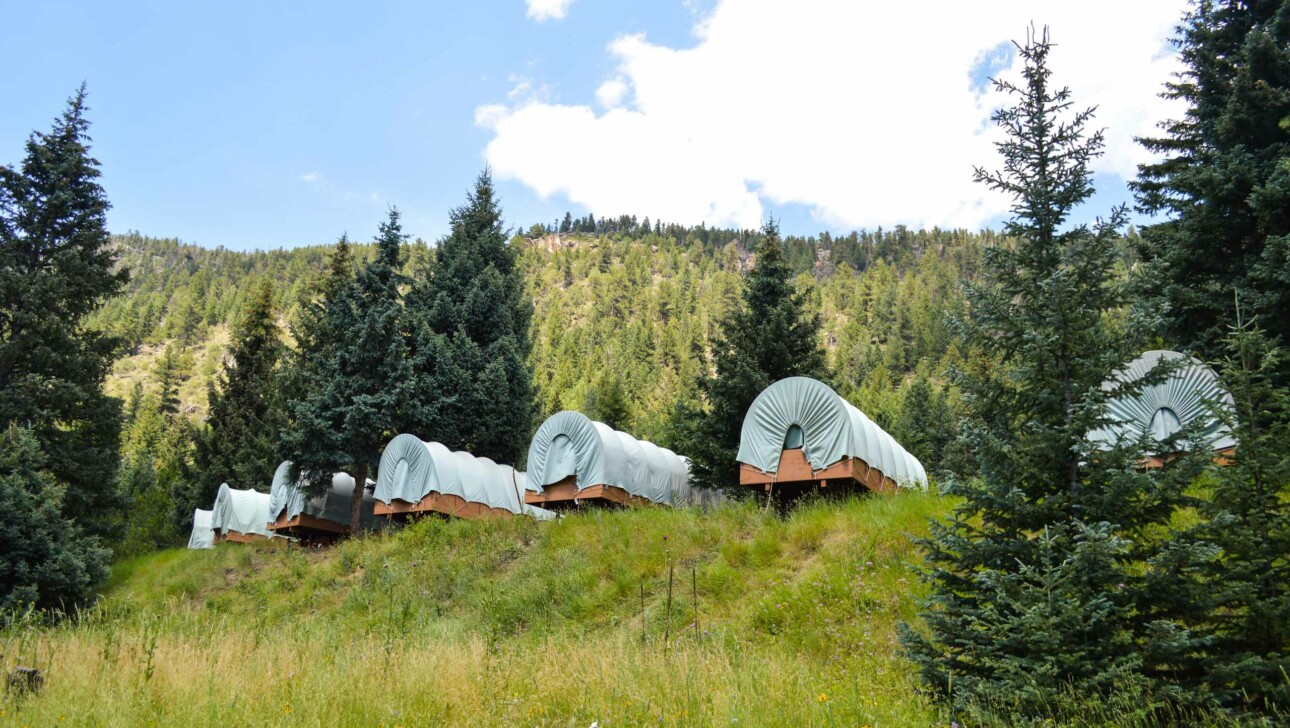 Cabins on mountain side.