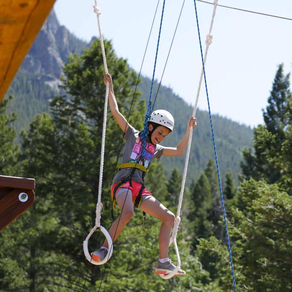 Girl on high ropes.