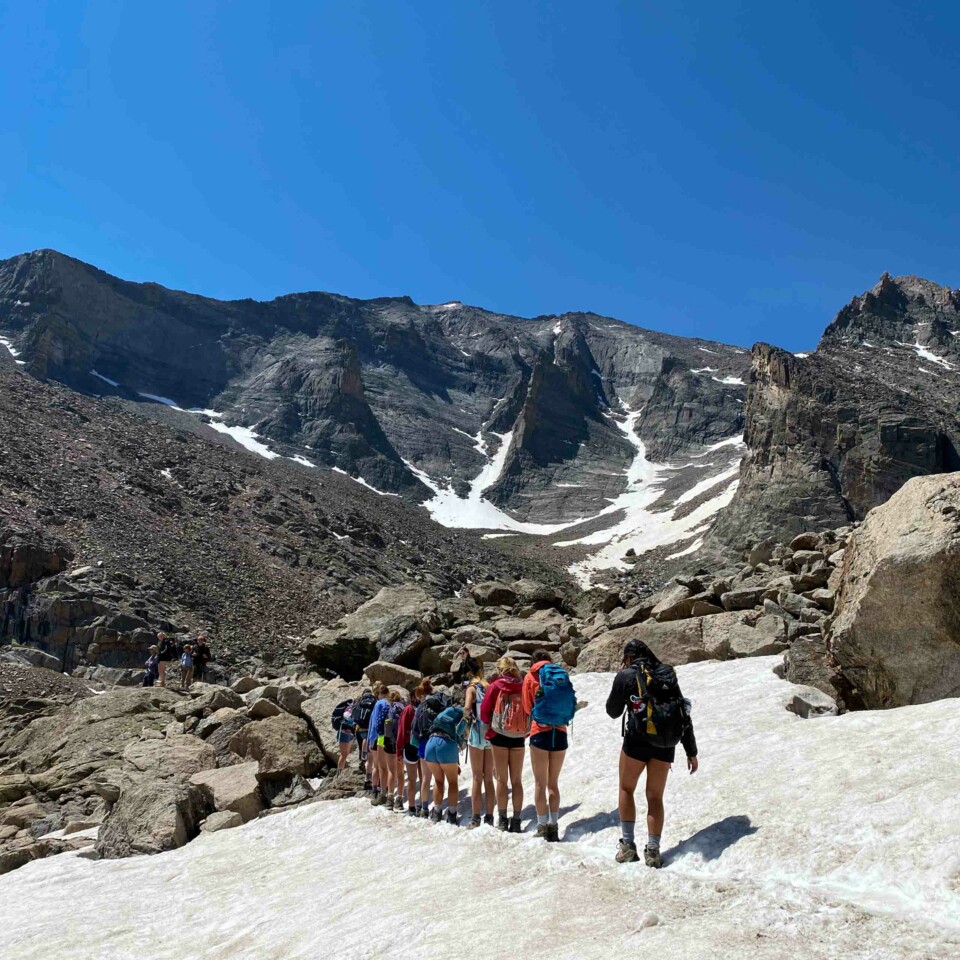 Girls hiking up salt mountain.