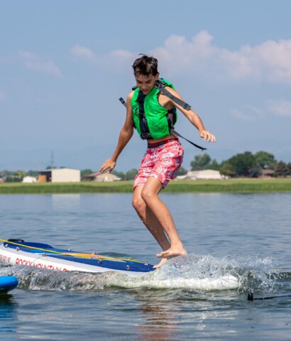 Boy on paddle board.