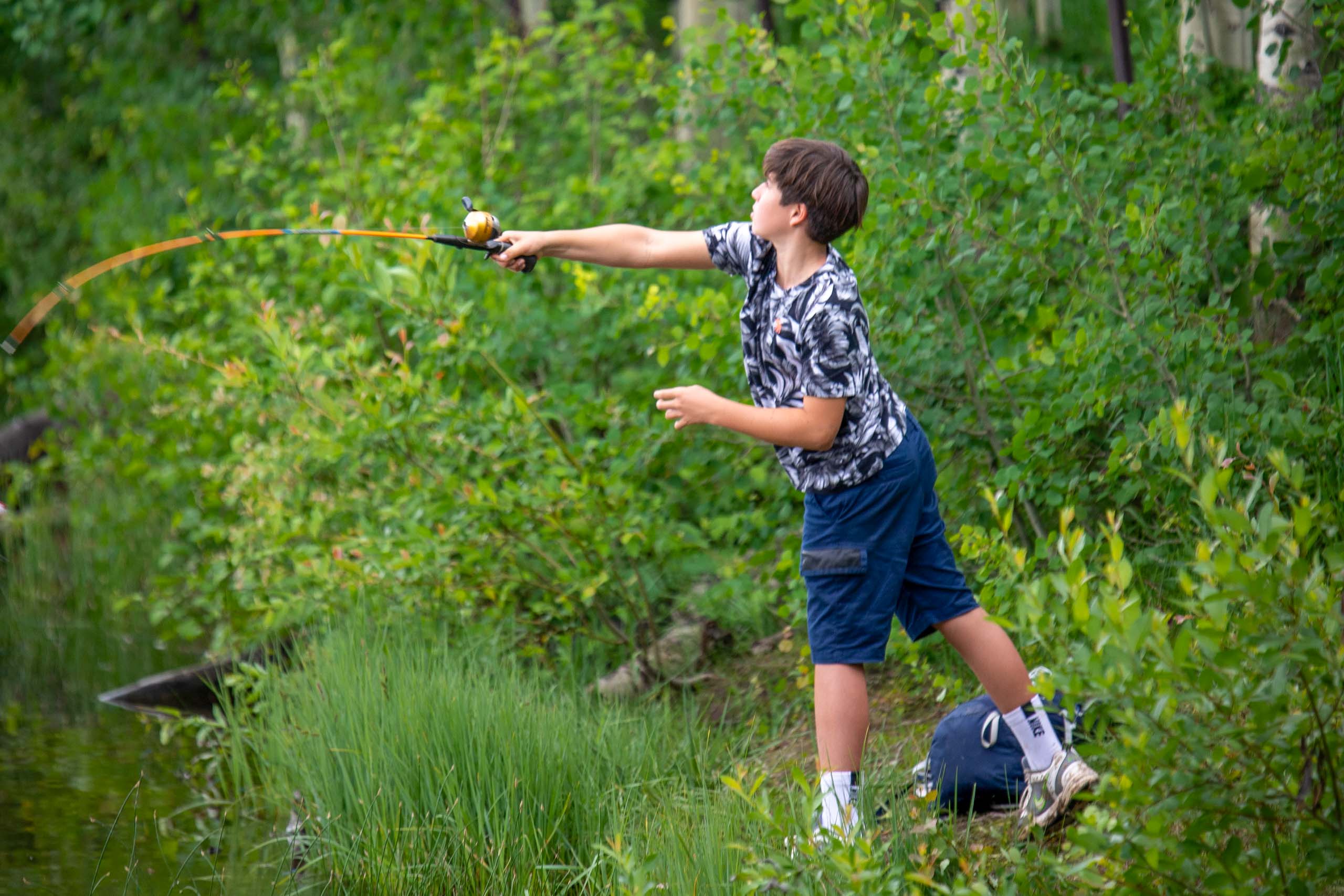 Boy fishing.