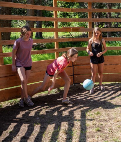 Girls playing volleyball.