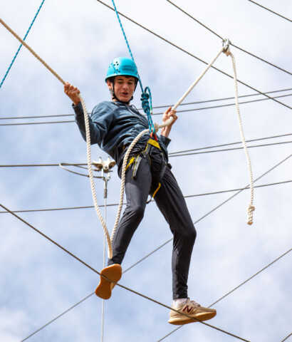 Boy in high ropes.