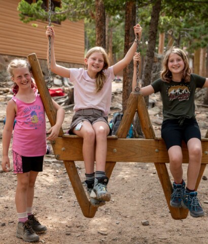 Girls smiling sitting.