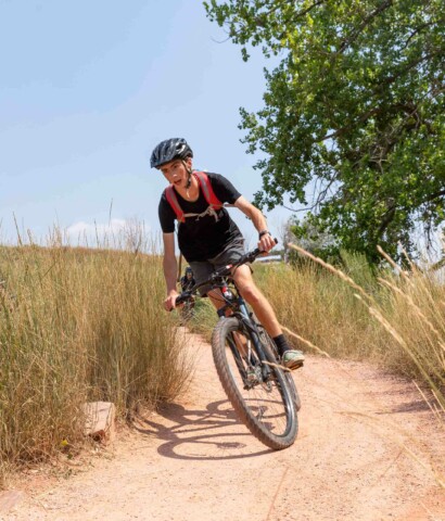 Boy riding a bike.