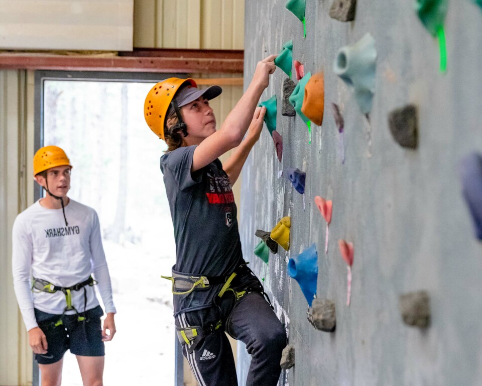 Boy rock climbing.