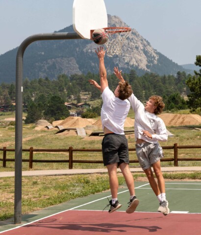 Boys playing basketball.