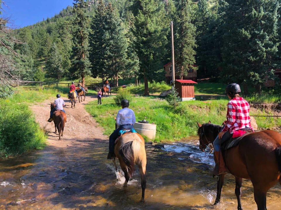 Family camp horseback riding.