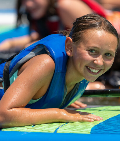 Girl on paddle board.