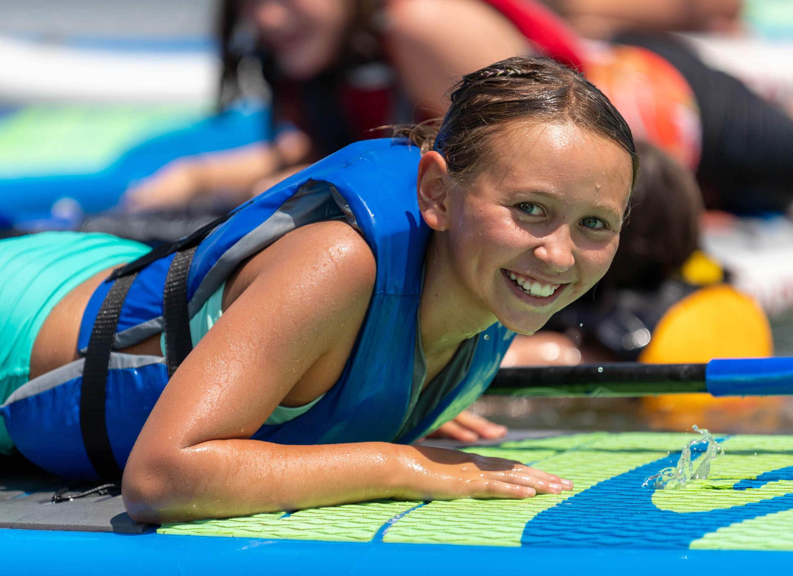 Girl on paddle board.