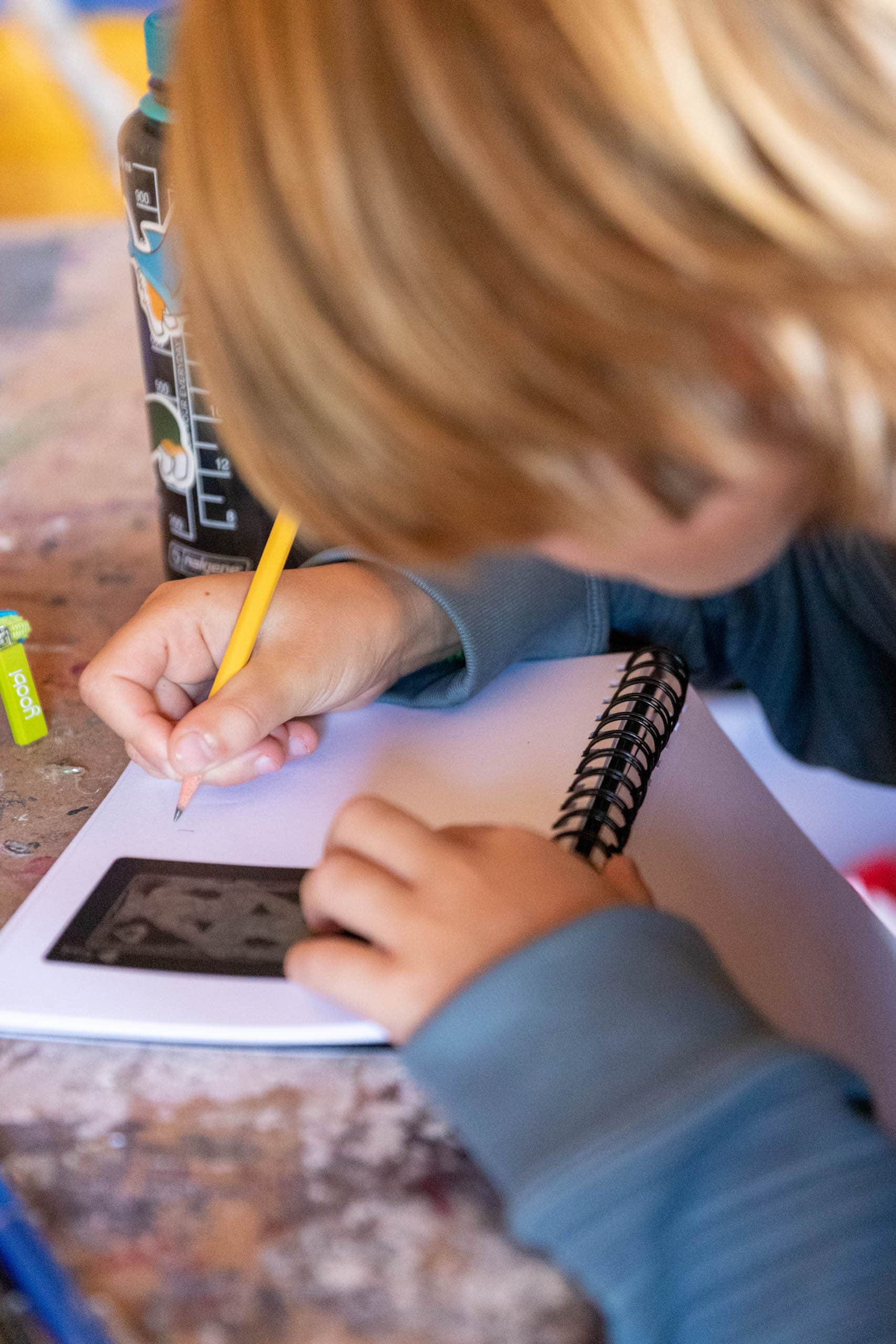 Camper working in his sketchbook.
