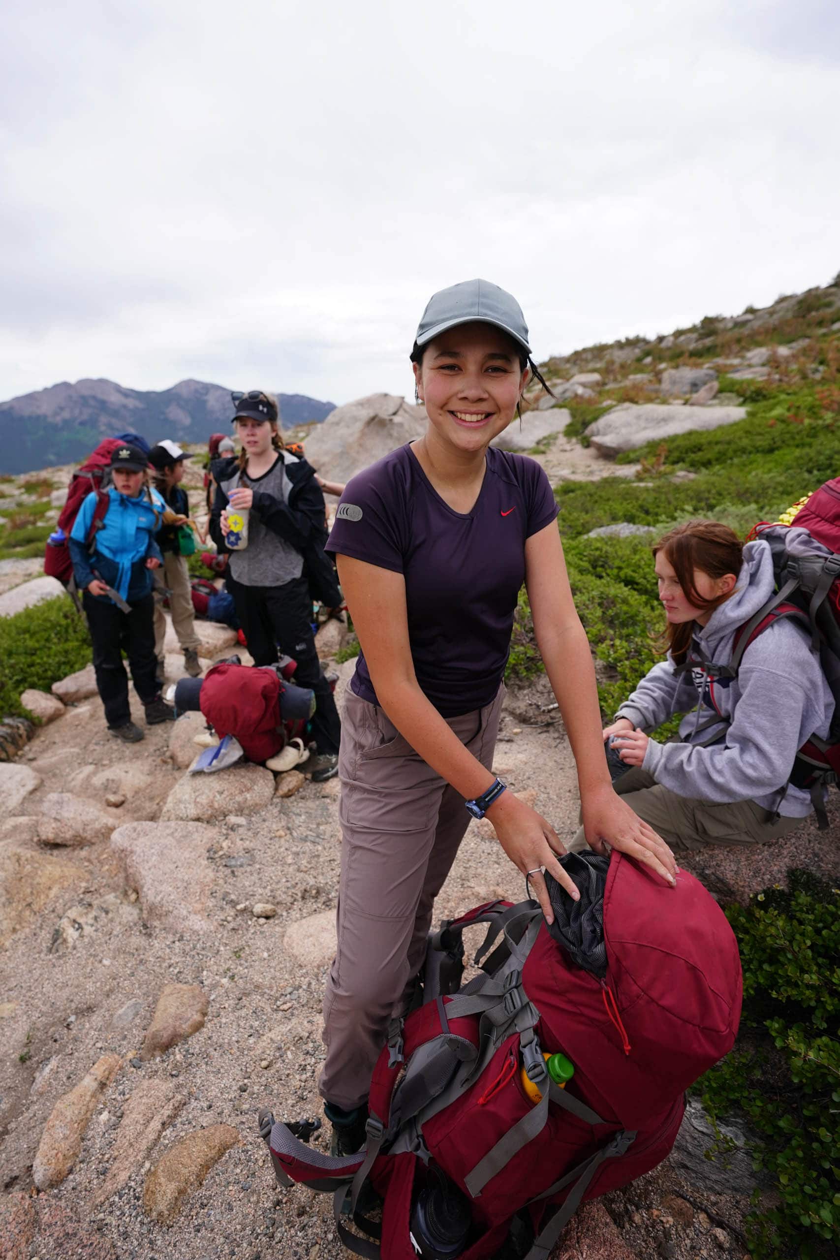 Campers taking a break while on a backpacking trip.