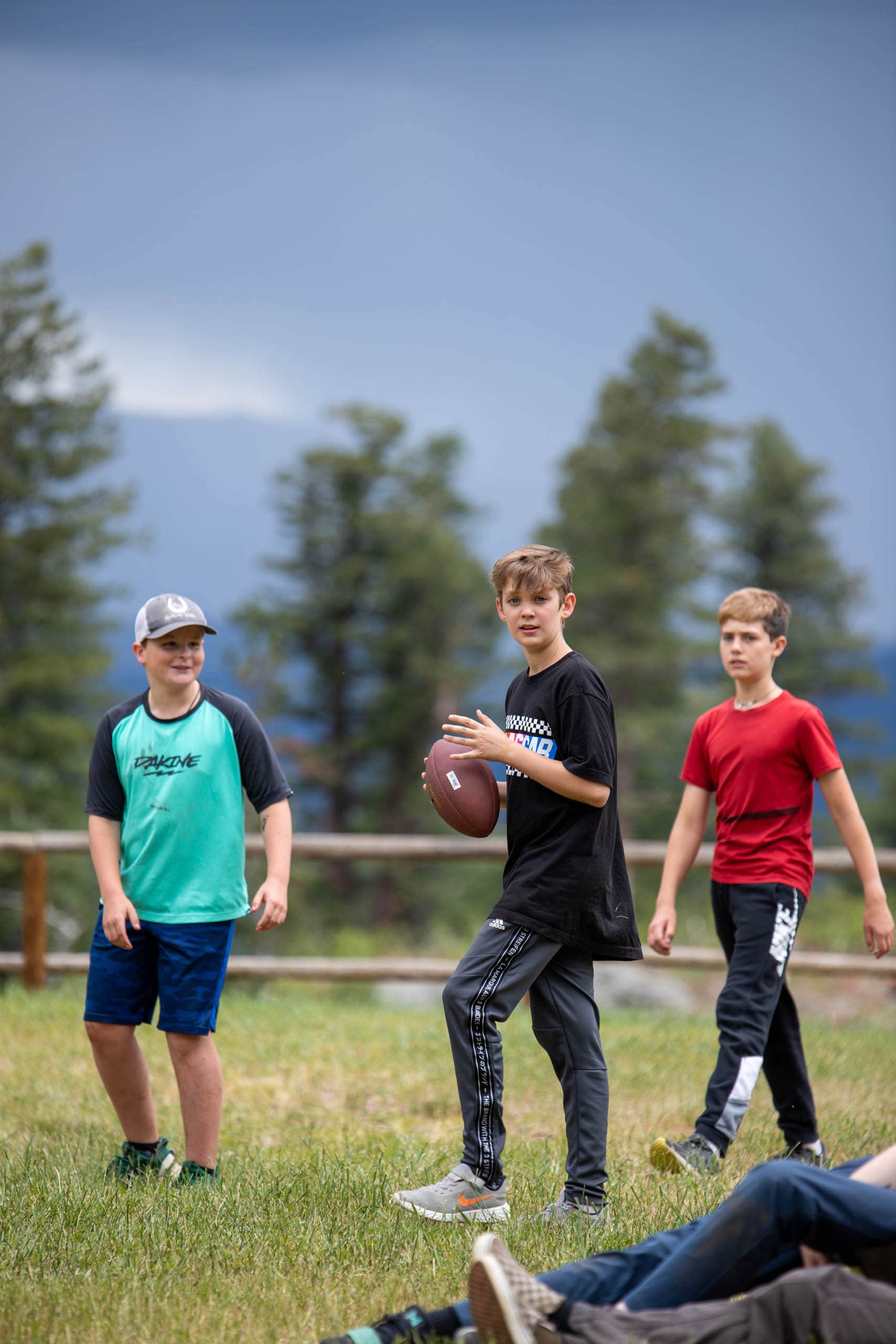 Campers playing football.