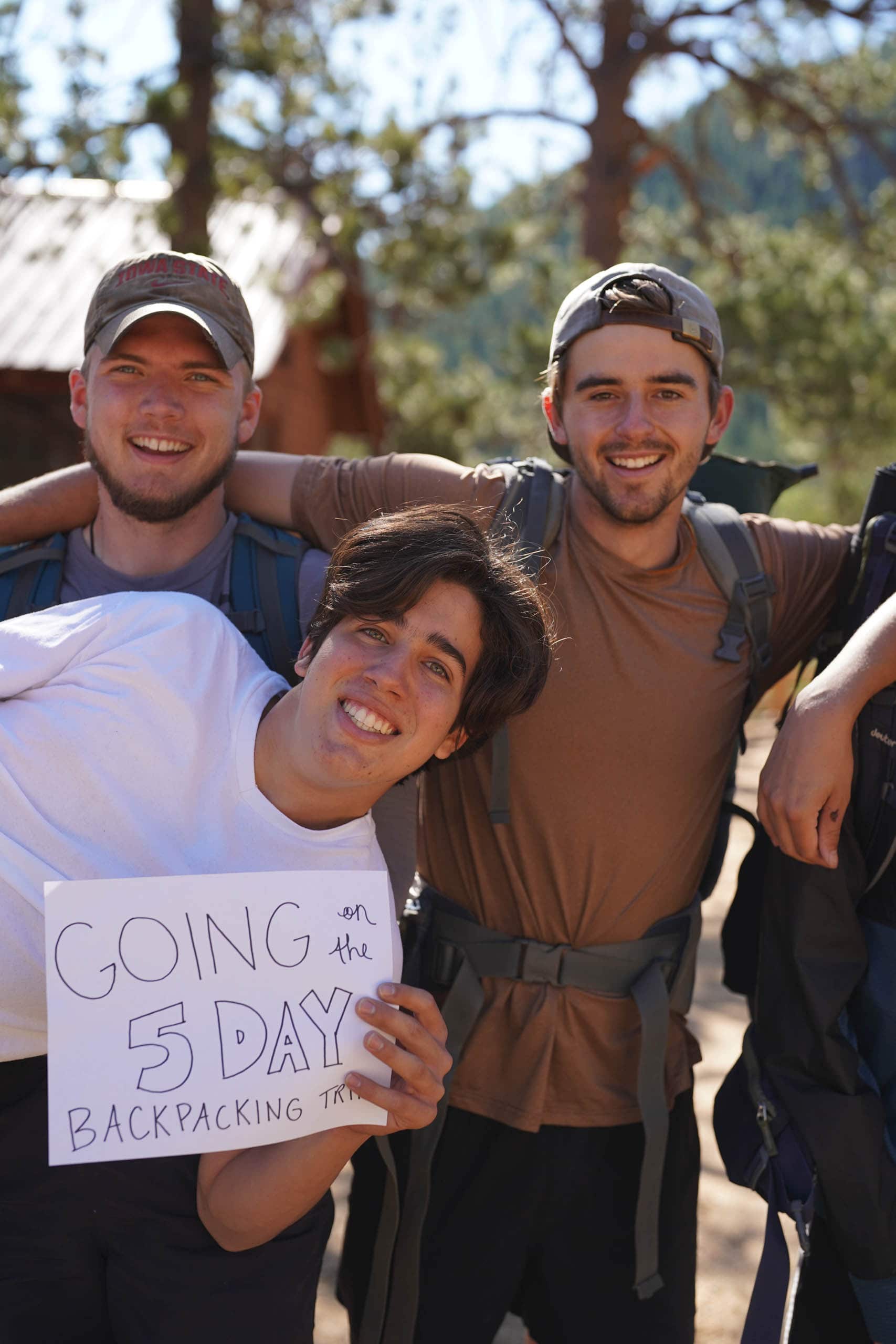 Group photo of campers about to go on a backpacking trip.