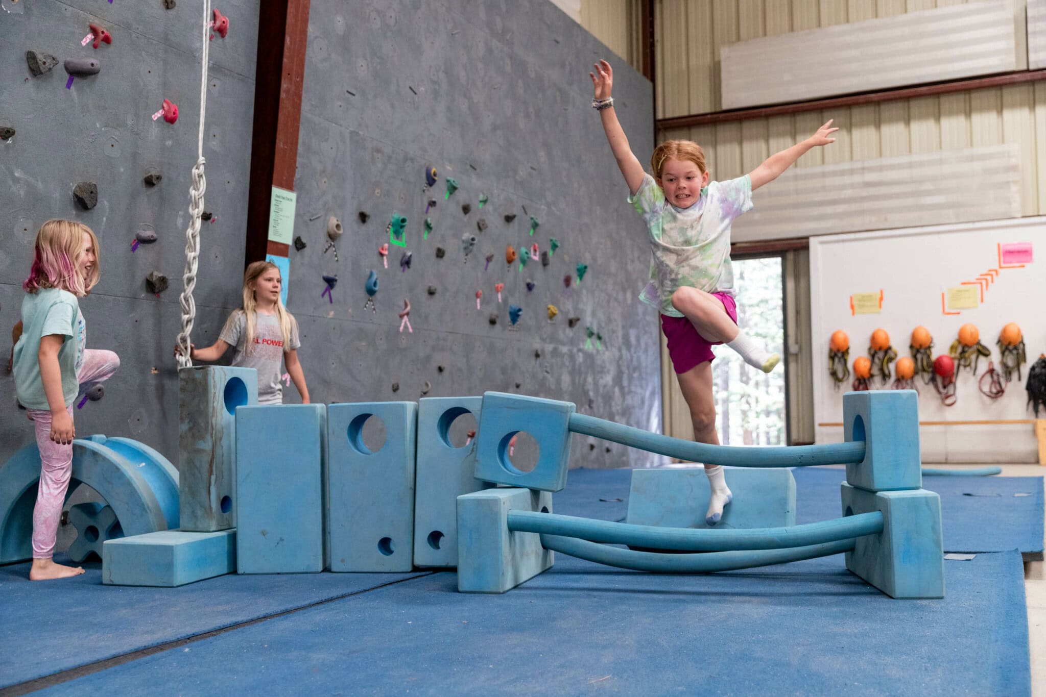 Campers in gymnastics class.